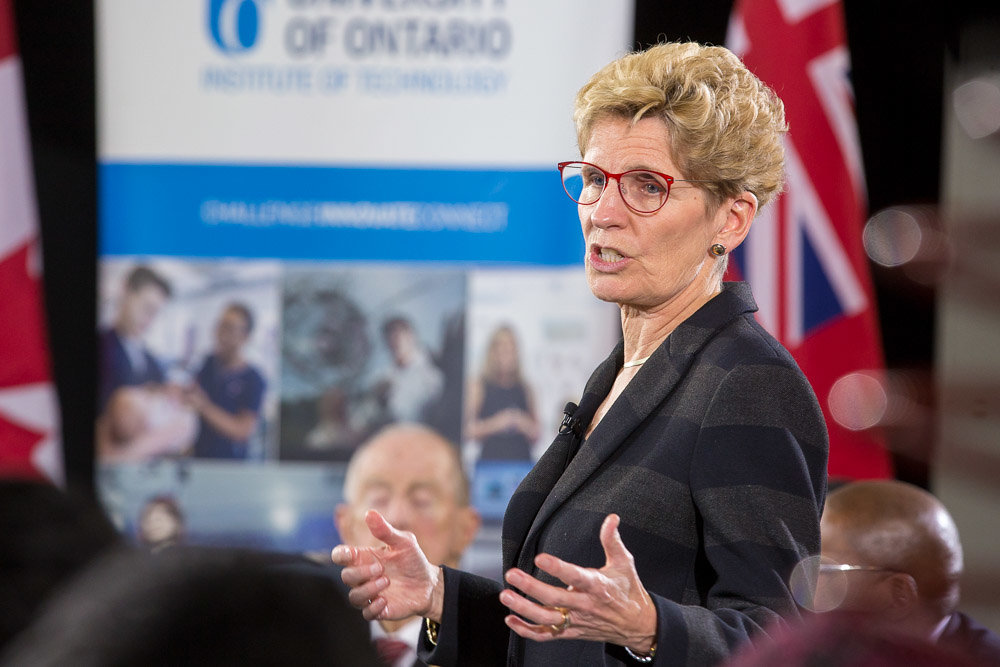 Premier Wynne takes questions from students during a round table session in the ACE Climatic Wind Tunnel.
